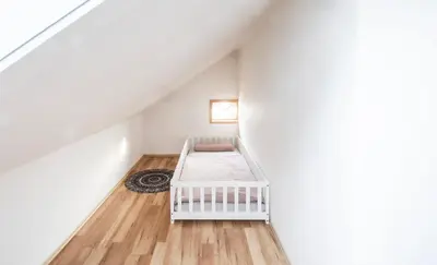 Ein Bett oder Betten in einem Zimmer der Unterkunft Ferienwohnung Firstblick