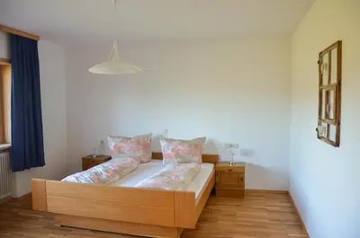 Ein Bett oder Betten in einem Zimmer der Unterkunft Ferienwohnung Kaspar Natter