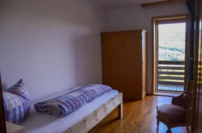 Ein Bett oder Betten in einem Zimmer der Unterkunft Ferienwohnung Kaspar Natter