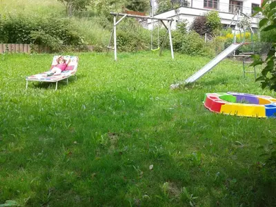 Ein Kinderspielbereich in der Unterkunft Apartment Große Wohnung in Silbertal mit Großem Garten by Interhome