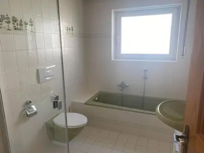 Ein Badezimmer in der Unterkunft Ferienhaus Wolfurt
