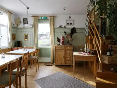 Ein Sitzbereich in der Unterkunft Holiday apartment in Bregenzerwald near forest