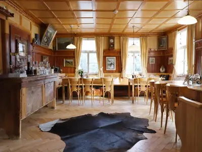 Ein Restaurant oder anderes Speiselokal in der Unterkunft Holiday apartment in Bregenzerwald near forest