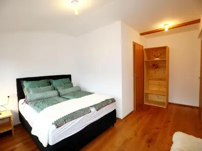 Ein Bett oder Betten in einem Zimmer der Unterkunft Holiday apartment in Bregenzerwald near forest