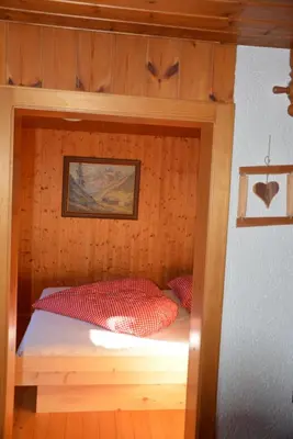 Ein Bett oder Betten in einem Zimmer der Unterkunft Ferienhaus Fritzensee