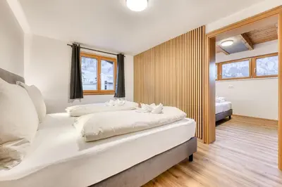Ein Bett oder Betten in einem Zimmer der Unterkunft Ferienwohnung Gipfelstube