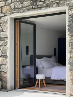 Ein Bett oder Betten in einem Zimmer der Unterkunft Alpencabin Montafon