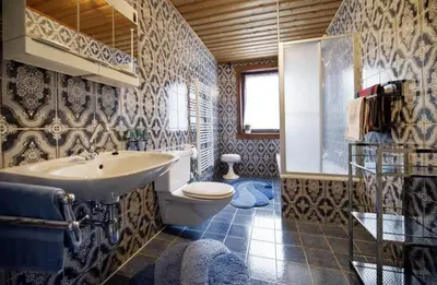 Ein Badezimmer in der Unterkunft White Summit Appartement