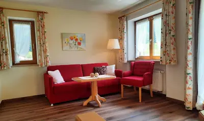 Ein Sitzbereich in der Unterkunft Gästehaus Martina