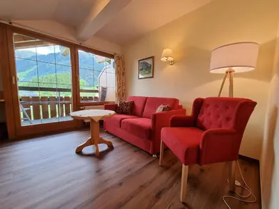 Ein Sitzbereich in der Unterkunft Gästehaus Martina