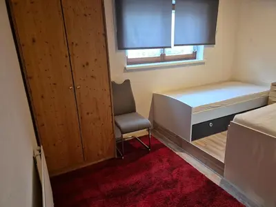 Ein Bett oder Betten in einem Zimmer der Unterkunft Mobers Alexander