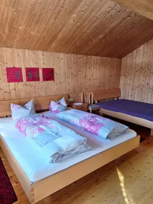 Ein Bett oder Betten in einem Zimmer der Unterkunft Ferienhof Muxel