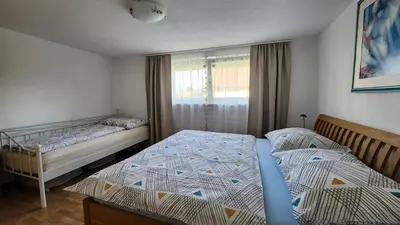 Ein Bett oder Betten in einem Zimmer der Unterkunft Ferienwohnung im Rheindelta