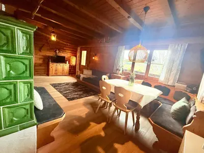 Ein Sitzbereich in der Unterkunft Ferienwohnungen im Blockhaus Metzler