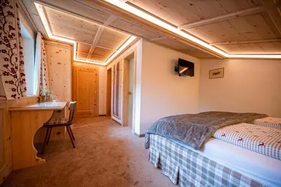 Ein Bett oder Betten in einem Zimmer der Unterkunft die AlpenRose