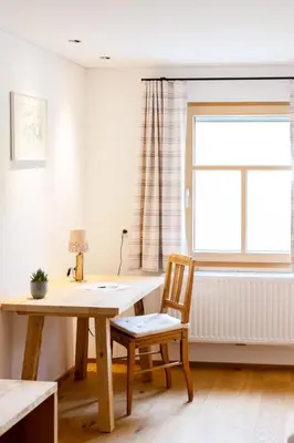 Ein Bett oder Betten in einem Zimmer der Unterkunft Gasthof Adler