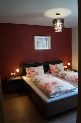 Ein Bett oder Betten in einem Zimmer der Unterkunft Landhaus Luzia