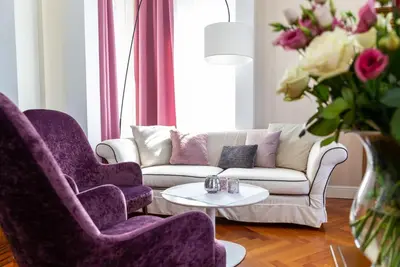 Ein Sitzbereich in der Unterkunft Boutiquehotel Bergvilla Am Fuße der Alpen