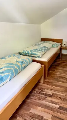 Ein Bett oder Betten in einem Zimmer der Unterkunft Haus Can
