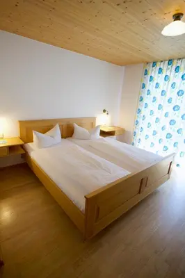 Ein Bett oder Betten in einem Zimmer der Unterkunft Hotel Dreiländerblick Dornbirn