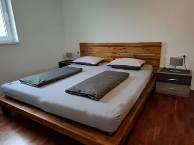 Ein Bett oder Betten in einem Zimmer der Unterkunft Ferienwohnung Daniela