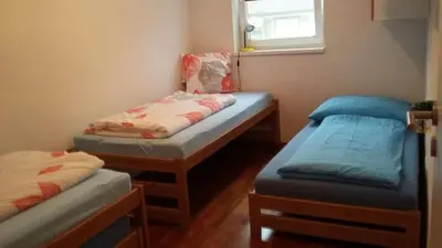 Ein Bett oder Betten in einem Zimmer der Unterkunft Ferienwohnung Daniela