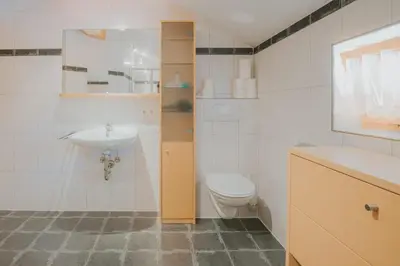 Ein Badezimmer in der Unterkunft Lari Fari