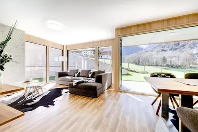 Ein Sitzbereich in der Unterkunft Montanara Lodge
