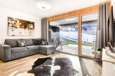 Ein Sitzbereich in der Unterkunft Montanara Lodge