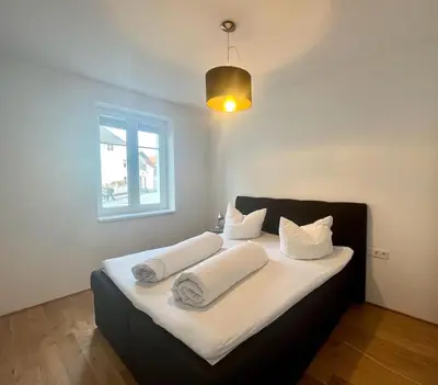 Ein Bett oder Betten in einem Zimmer der Unterkunft Ferienhaus Ritter
