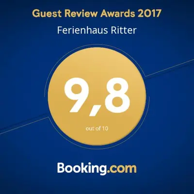 Ein Zertifikat, Auszeichnung, Logo oder anderes Dokument, das in der Unterkunft Ferienhaus Ritter ausgestellt ist