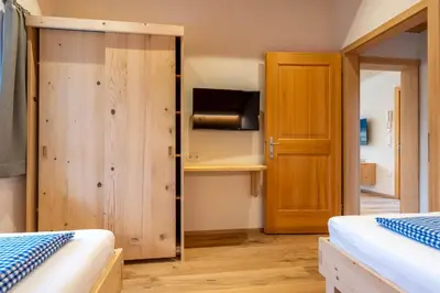 Ein Bett oder Betten in einem Zimmer der Unterkunft Ferienbauernhof Berlinger