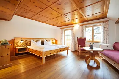 Ein Bett oder Betten in einem Zimmer der Unterkunft Breitachhus