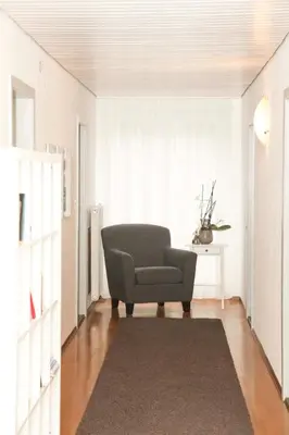 Ein Sitzbereich in der Unterkunft Gasthof Linde