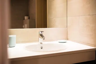 Ein Badezimmer in der Unterkunft Gästehaus Meusburger