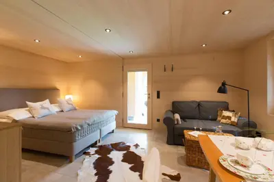 Ein Bett oder Betten in einem Zimmer der Unterkunft Gartenstudio Waldblick