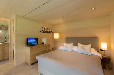 Ein Bett oder Betten in einem Zimmer der Unterkunft Gartenstudio Waldblick