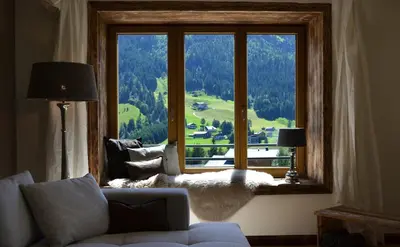 Ein Sitzbereich in der Unterkunft Ahorn Chalet Mittelberg