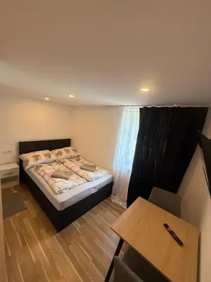 Ein Bett oder Betten in einem Zimmer der Unterkunft Gasthaus Tisis