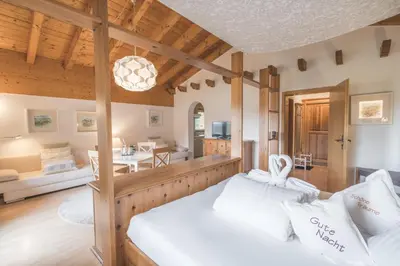 Ein Bett oder Betten in einem Zimmer der Unterkunft Alpenhotel DAS KÜREN