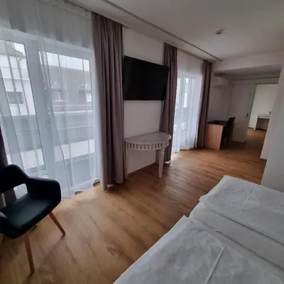 Ein Bett oder Betten in einem Zimmer der Unterkunft Hotel Central