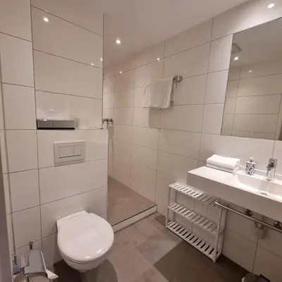 Ein Badezimmer in der Unterkunft Hotel Central