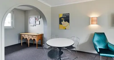 Ein Sitzbereich in der Unterkunft Schlosshotel Dörflinger