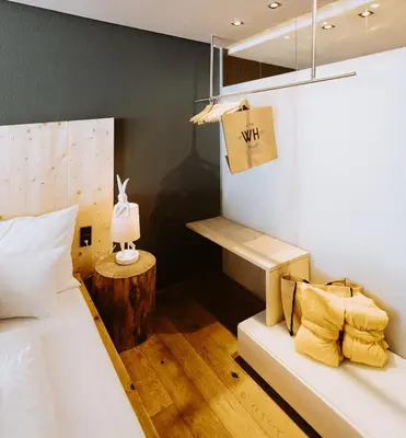 Ein Bett oder Betten in einem Zimmer der Unterkunft Walliserhof