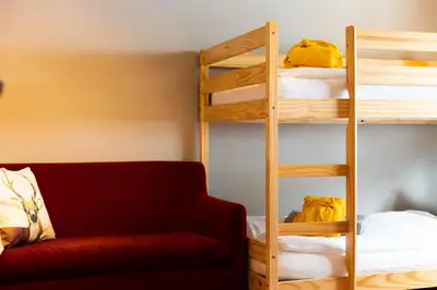 Ein Bett oder Betten in einem Zimmer der Unterkunft Walliserhof