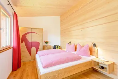 Ein Bett oder Betten in einem Zimmer der Unterkunft Gastler Chalet