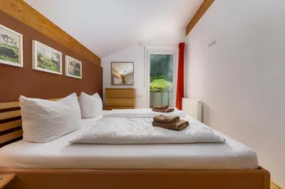 Ein Bett oder Betten in einem Zimmer der Unterkunft Haus Röcken