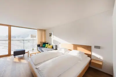 Ein Bett oder Betten in einem Zimmer der Unterkunft Hotel Krone in Au