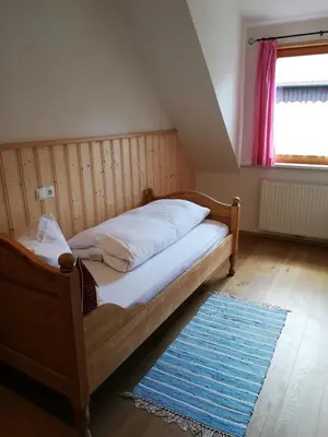 Ein Bett oder Betten in einem Zimmer der Unterkunft „Lebenslust“