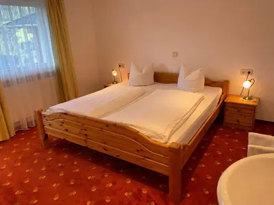 Ein Bett oder Betten in einem Zimmer der Unterkunft Haus Resi